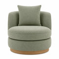Silla giratoria de tela bouclé verde con base de madera